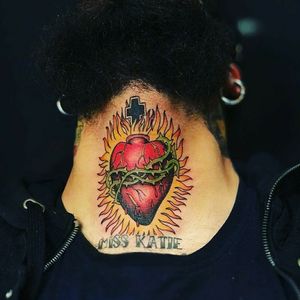 Traditional sacred heart tattoo in the neck