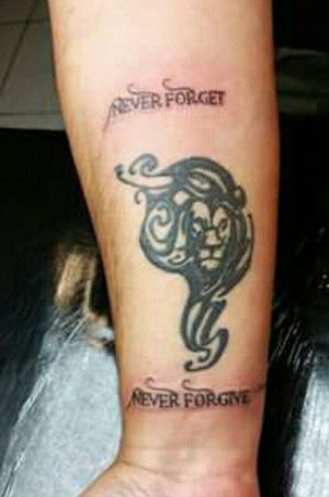Never forget. Never forgive lion.