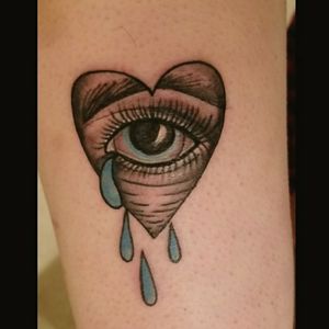 crying eye on my right thigh. Done in worcester mass