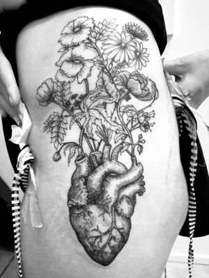 Anatomical heart and flowers designed and inKed by K#tattoo #ink #tatttoos #worldfamousink #eikondevice #greenmonster #tattooaddictsouthafrica #gunwax #thelightningstation #tam #tattoodo #inkbe #heart #hearttattoo #flowers #wildflowers #flowertattoo #blackwork #etchingtheskin
