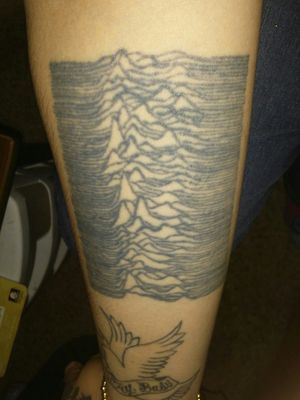 This was the first tattoo I ever got when I was 18. It's the album art from Joy Division's Unknown Pleasures, but I also liked the fact that they got the design from an astrology magazine. 