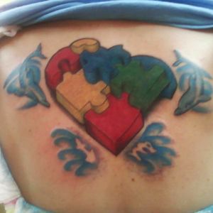 Autism heart with my kids birth signs and 2 dolphins for my kids 