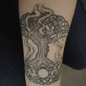 Tree of life with celtic weave and triple goddess symbol