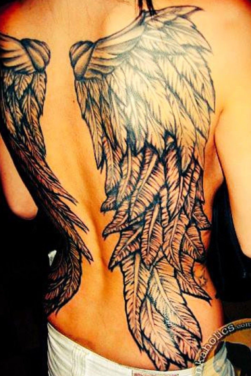 angel wing tattoos on back for men