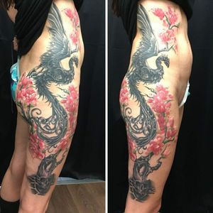 Phoenix rising from the ashes with cherry blossom thigh piece. #thightattoos #girlswithtattoos #womenwithtattoos #inkedup #inkedgirl #phoenixtattoo #risingphoenix #girlpower #cherryblossomtattoo #cherryblossom 