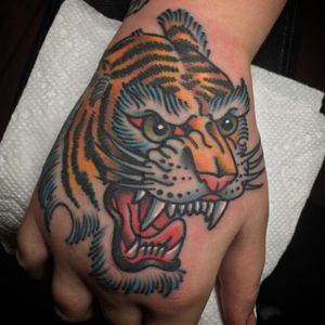 Tiger by Matt Nemeth at Lakeside Tattoo, Va. #tiger #tigertattoo  #tigerhead #traditional #handtattoo 