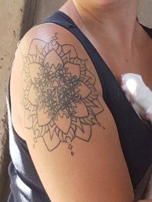 Mandala design that's not done yet. Had it done by Warren @ Little Shop Of Horrors