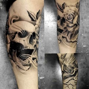 Realistic Skull,Crow, and two Roses. One not pictured that's on the back of my calf. First session done at Tat2Tyme.Second session done at Tomahawk Tattoo studio.14 Hours total.Artist: Jin Dermagraphics.