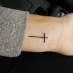 Cross on wrist