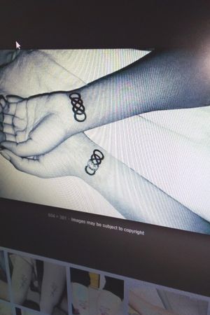 Me and my suster want this tattoo with a letter of my and her name 