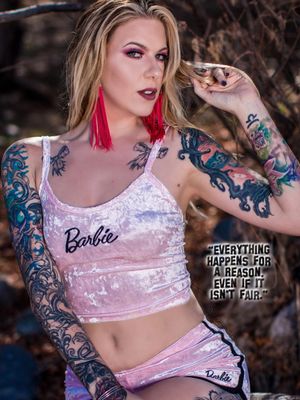 Front cover model of inkd barbie magazine,, tattoos done by brian hopson,, tony ewald,, and dean Baumgartner 