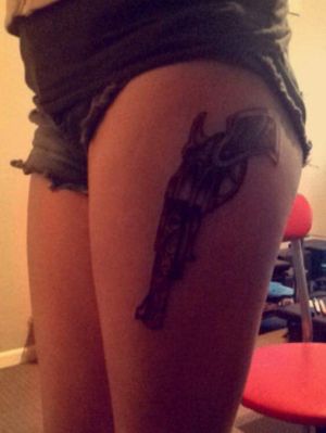 The start of the gun amd garter tattoo