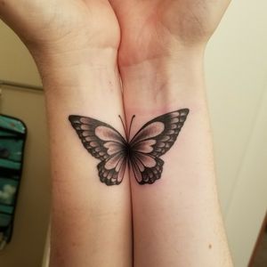 matching mother and daughter butterfly tattoo 