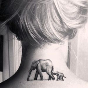Mama and baby elephant neck tattoo