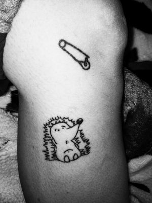 Healed Little hedgehog and and a safety pin Done by me #stickandpoke #handpokedtattoo #safetypin #hedgehog 