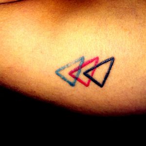 Three triangles made by Jorge Chigne #triangles #triangletattoo #colortattoo #littletattoo #geometrictattoo #arm 