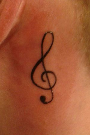Tattoo behind my ear. I love it.