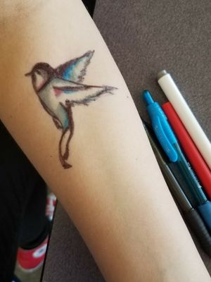 Quick temporary tattoo for my friend at school. It is a swallowtail bird I did with a black pen, blue pen, red flare pen, and a grey marker.