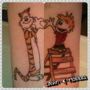 Calvin and Hobbes matching tattoos