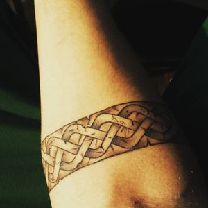 celtic band on my right fore arm, done completely free hand (picture is 18 months old)