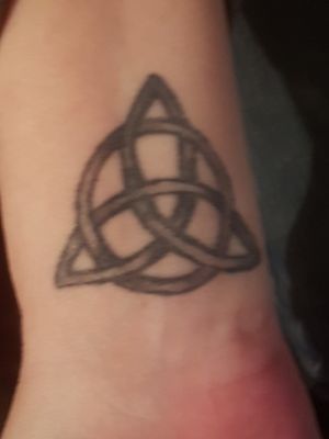 A triquetra, the power of three from the series Charmed. 
