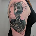 New tattoo, more to come! #music #musictattoo #microphone #headphones #musicnotes 