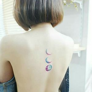 Credit to instagram : @tattoozoan #color #colorful #moontattoo #moon #moonphasetattoos #backtattoo #back #art 