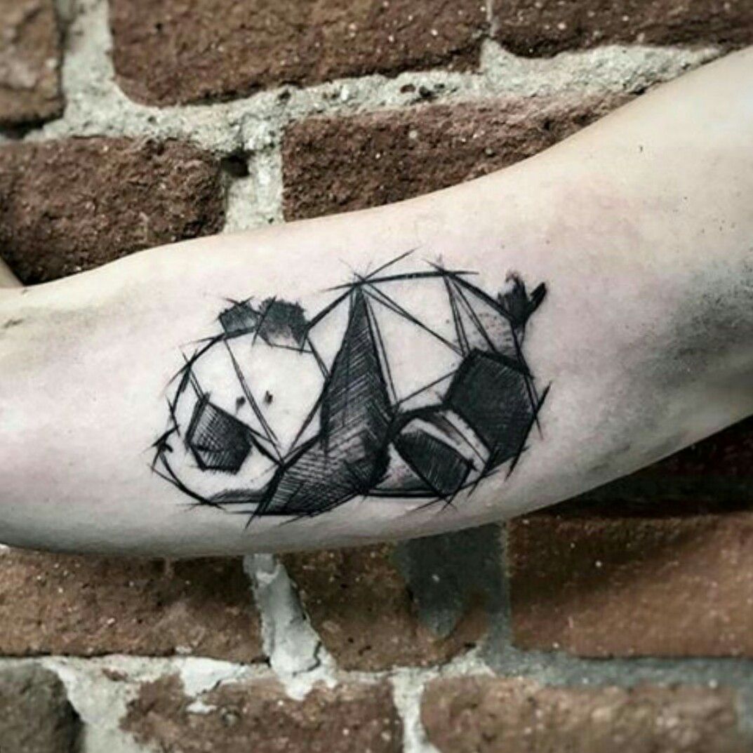 Panda bear tattoo on the ankle