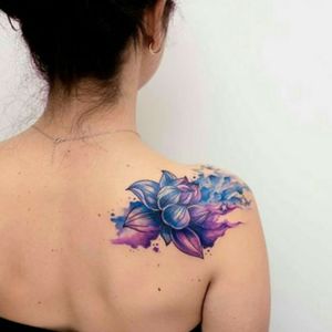 Credit to instagram : @inkgrams#flower #flowertattoo #watercolortattoo #blue #purpleflower #shouldertattoo #art 