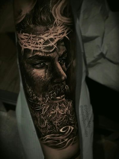 jesus forearm tattoo