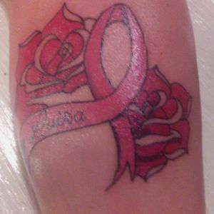 Omenage tattoo cancer