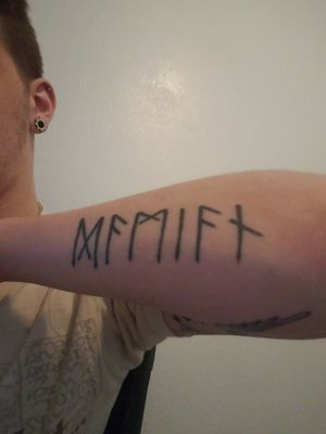 My first tattoo, which says "Damian" in Norse runes which is my middle name. 