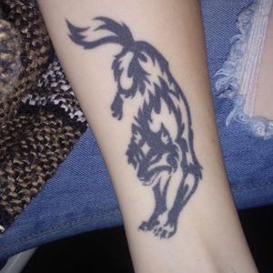 Tribal wolf tattoo (only half. My bestfriend has the other to make a yin yang)