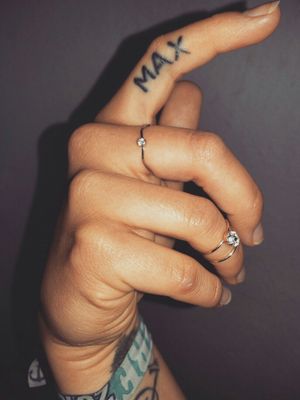 2k13.#finger #fingertattoo #max #dogtattoo #blacktattoos #wristattoo 