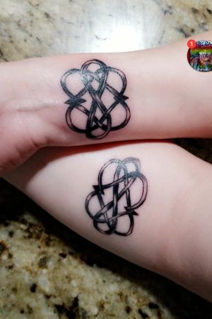 Tattoo: Mother and Daughter Heart KnotsPlacement: WristInk: EternalTime: 30min 