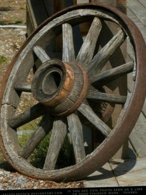 "Hey Mama Rock Me" would be surrounding this image of a wagon wheel. You get double coolness factor if you know Darius Rucker was not the original writer, singer, or performer of the song!