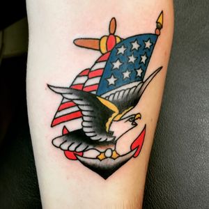 traditional eagle with american flag tattoo