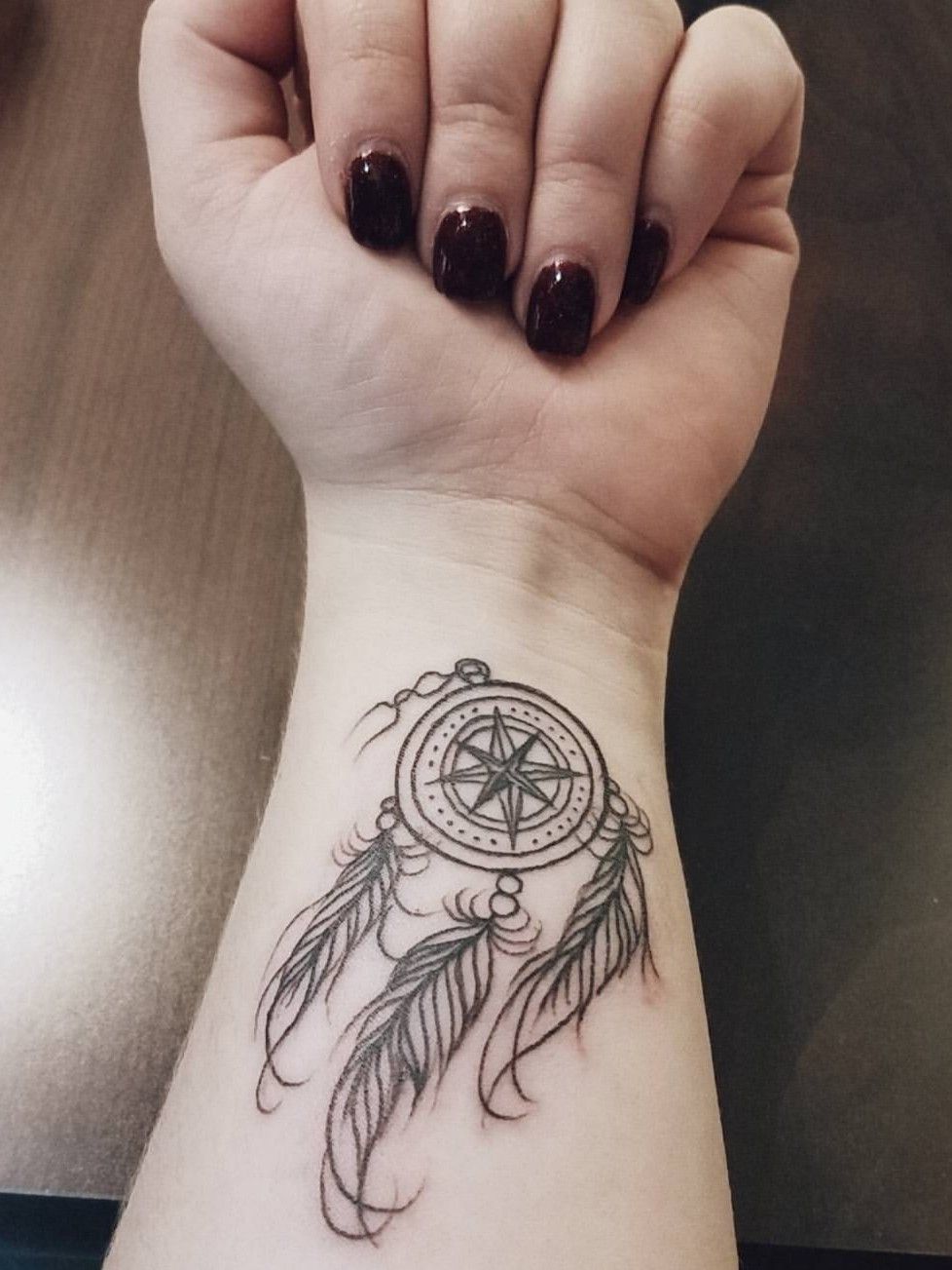 Dreamcatcher tattoos on wrist