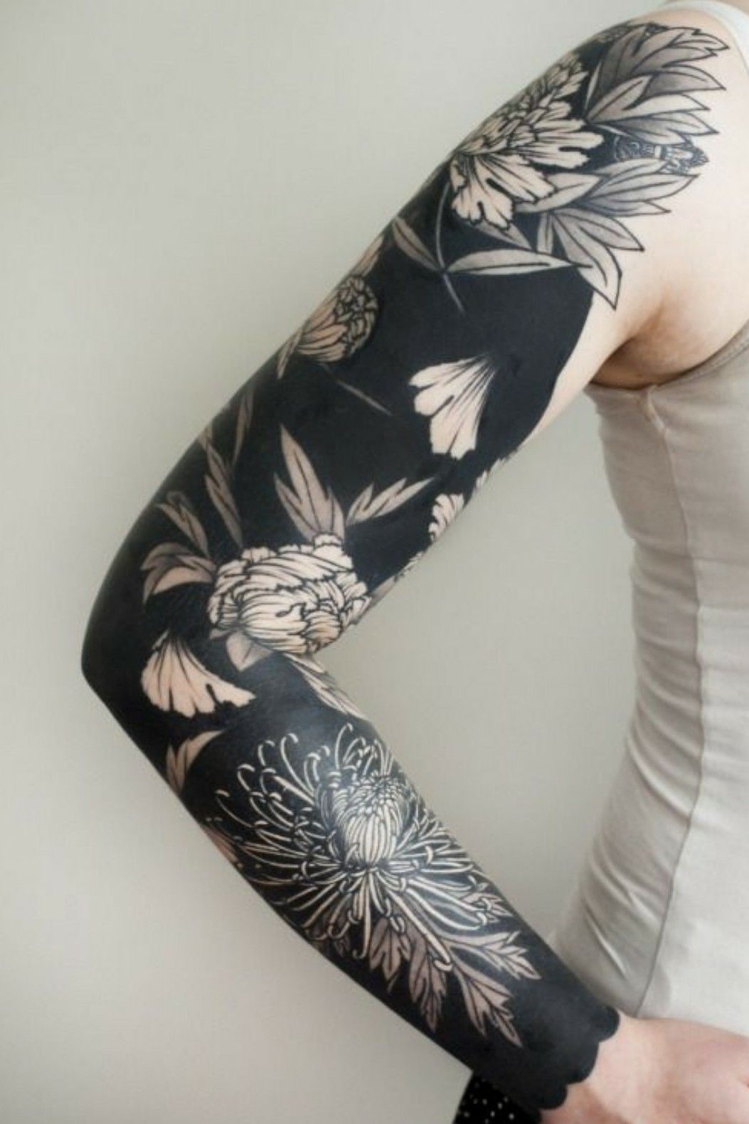 Tattoo Artist Esther Garcia Creates Beautiful Blackout Tattoo Designs That  Cover Large Areas