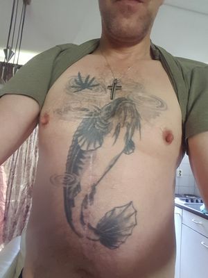 My Filleted catfish. I had it tattooed in 1996 so 22 years ago and it still looks good. Had an operation and the a specialist sewed it up as nice as he could.He did a nice job. 