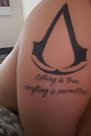First tattoo received on sunday January 7th, 2018Logo and quote from my favorite game assassin's creed 