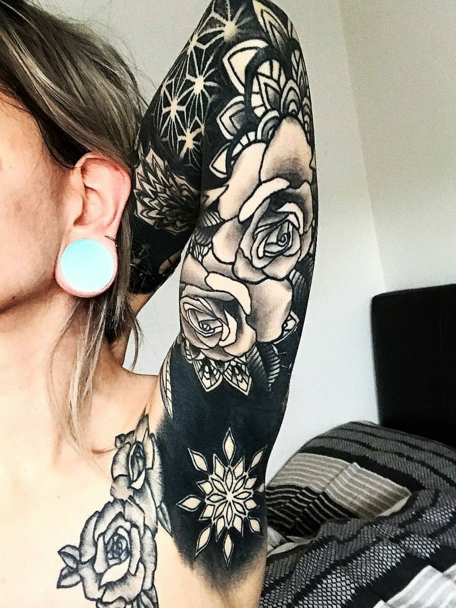 Brilliant Coverup Tattoos Combine Blackout Ink with Blossoms