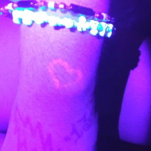 At home uv reactive ink heart on my wrist