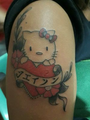 Hello Kitty:Clients Choice:From GoogleP.S. I just tattoed it. I dont know the artist. Sorry for that.