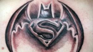 This is a tattoo i did on a friend .Batman and superman logo for a marvel fan x 😁
