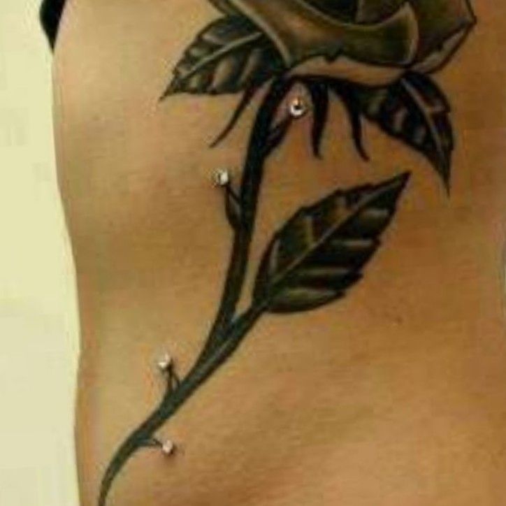25 Tattoo And Piercing Combinations That Make Ink Shine