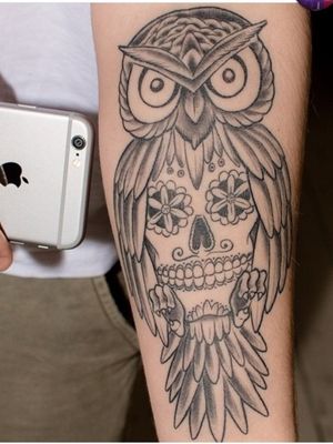 I so love this tattoo, I wanna get it within the few months,.I love skulls (Ain't plan, It looks awesome), And owls! 