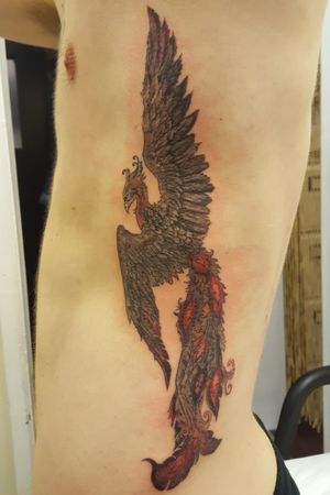 A phoenix would usually be done in beautiful bright colours, but this client wanted his in black and grey, apart from the odd red and orange hue. #tattoooftheday #phoenix #blackandgrey 