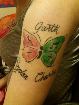 Semi colon butterfly symbolizing the transformation after deep depression. The pink supporting the people I've to Cancer, the green giving awareness to my disability Cerebral palsy. My crosses for my Christian belief and music notes for the love of music. My three bother protecting me all time. And the whole tattoo for the love of art.