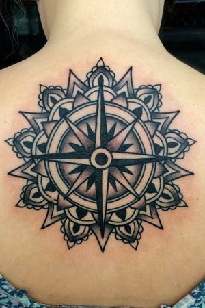 This mandala compass is on my upper back. Its about 6 inches in diameter.